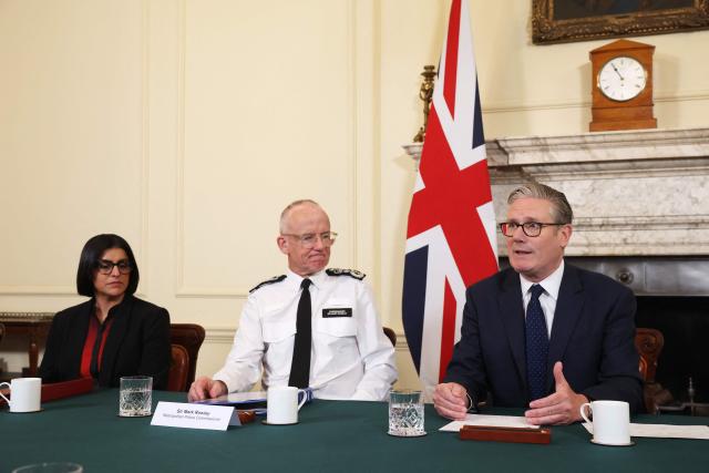 Britain's Prime Minister Keir Starmer (R) convenes a meeting of criminal justice agencies as Britain's Home Secretary Shabana Mahmood (L) and Metropolitan Police Commissioner Mark Rowley (C) look on, following the Golders Green attack the day before, in Downing Street in central London on April 30, 2026. The UK government on April 30 announced an extra 25 million pound (33 million USD) for security outside synagogues and schools, a day after two Jews were stabbed in the latest attack on the community. (Photo by Dan Kitwood / POOL / AFP)