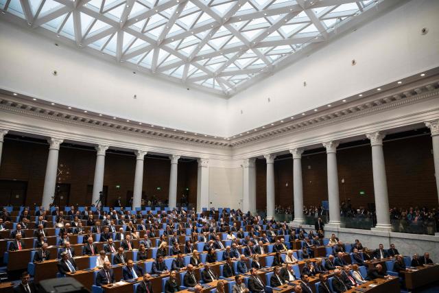 Members of parliament attend the first session of the parliament following the snap election, in Sofia on April 30, 2026. Progressive Bulgaria coalition's leader and former President Rumen Radev, an EU critic who wants renewed dialogue with Russia, won an absolute majority in the parliamentary elections held on April 19, 2026, and is set to become head of government. (Photo by Nikolay DOYCHINOV / AFP)