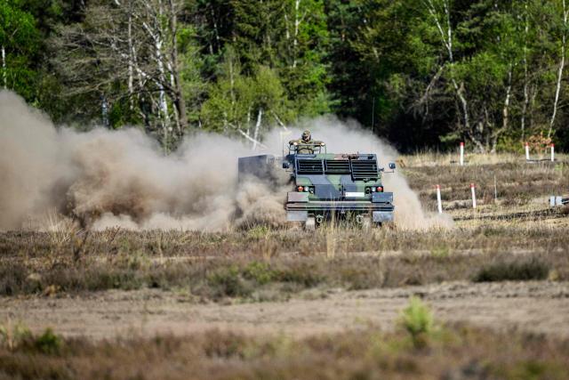 A MARS rocket launcher of the German army operates during a presentation at the German army barracks while the German Chancellor (unseen) visits the troops of the German Army in Munster, northern Germany, on April 30, 2026. (Photo by DANIEL REINHARDT / AFP)