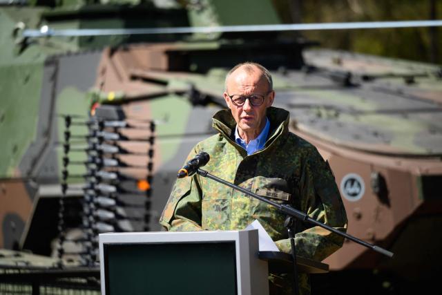 German Chancellor Friedrich Merz addresses journalists during his visit of the German army barracks in Munster, northern Germany, on April 30, 2026. (Photo by DANIEL REINHARDT / AFP)