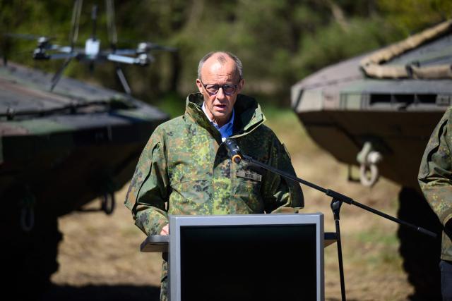 German Chancellor Friedrich Merz addresses journalists during his visit of the German army barracks in Munster, northern Germany, on April 30, 2026. (Photo by DANIEL REINHARDT / AFP)