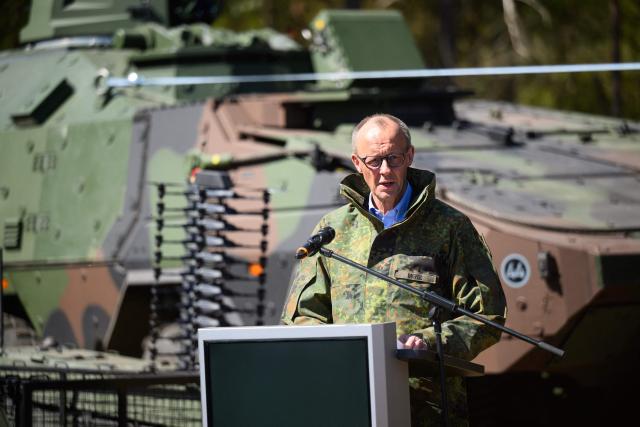 German Chancellor Friedrich Merz addresses journalists during his visit of the German army barracks in Munster, northern Germany, on April 30, 2026. (Photo by DANIEL REINHARDT / AFP)