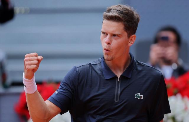 Belgium's Alexander Blockx celebrates beating Norway's Casper Ruud during their 2026 ATP Tour Madrid Open tennis tournament quarter-final singles match at the Caja Magica in Madrid, on April 30, 2026. (Photo by Thomas COEX / AFP)