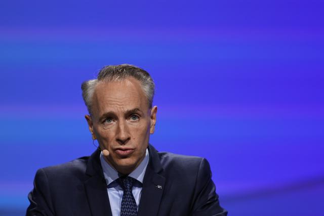 CEO of AXA Thomas Buberl speaks during the French multinational insurance corporation Axa general assembly at the Salle Pleyel, in Paris on April 30, 2026. (Photo by Anne-Christine POUJOULAT / AFP)