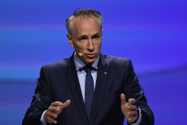 CEO of AXA Thomas Buberl speaks during the French multinational insurance corporation Axa general assembly at the Salle Pleyel, in Paris on April 30, 2026. (Photo by Anne-Christine POUJOULAT / AFP)