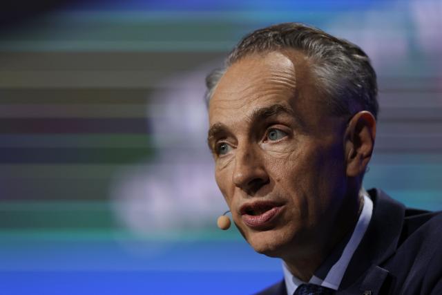 CEO of AXA Thomas Buberl speaks during the French multinational insurance corporation Axa general assembly at the Salle Pleyel, in Paris on April 30, 2026. (Photo by Anne-Christine POUJOULAT / AFP)