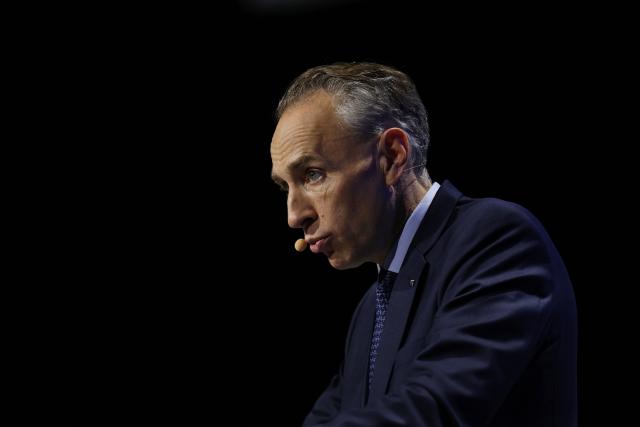 CEO of AXA Thomas Buberl speaks during the French multinational insurance corporation Axa general assembly at the Salle Pleyel, in Paris on April 30, 2026. (Photo by Anne-Christine POUJOULAT / AFP)
