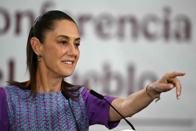 Mexico's President Claudia Sheinbaum points towards journalists during her daily press conference at the Palacio Nacional in Mexico City on April 30, 2026. Mexican federal prosecutors said on April 29 that they will open an investigation into the governor of Sinaloa state after US authorities brought narcotrafficking charges against Ruben Rocha Moya and several associates. (Photo by YURI CORTEZ / AFP)