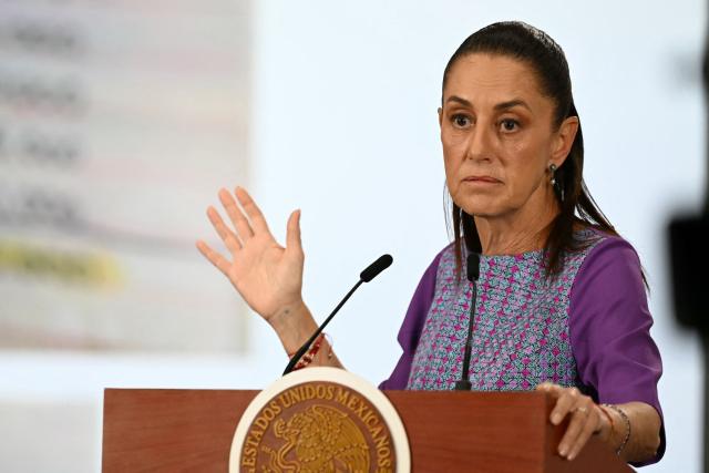 Mexico's President Claudia Sheinbaum speaks during her daily press conference at the Palacio Nacional in Mexico City on April 30, 2026. Mexican federal prosecutors said on April 29 that they will open an investigation into the governor of Sinaloa state after US authorities brought narcotrafficking charges against Ruben Rocha Moya and several associates. (Photo by YURI CORTEZ / AFP)