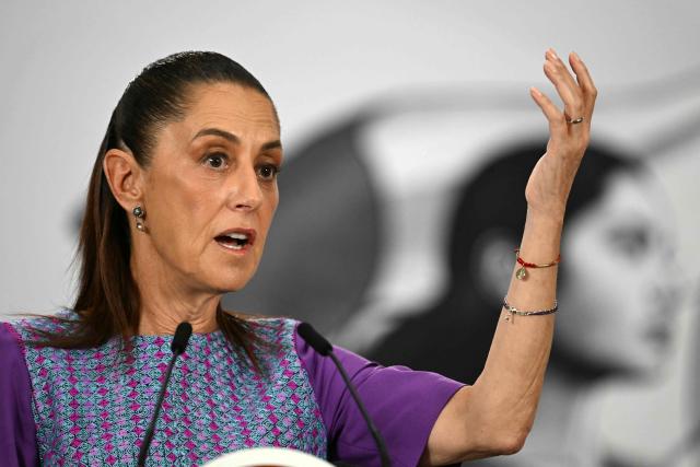 Mexico's President Claudia Sheinbaum gestures as she speaks during her daily press conference at the Palacio Nacional in Mexico City on April 30, 2026. Mexican federal prosecutors said on April 29 that they will open an investigation into the governor of Sinaloa state after US authorities brought narcotrafficking charges against Ruben Rocha Moya and several associates. (Photo by YURI CORTEZ / AFP)