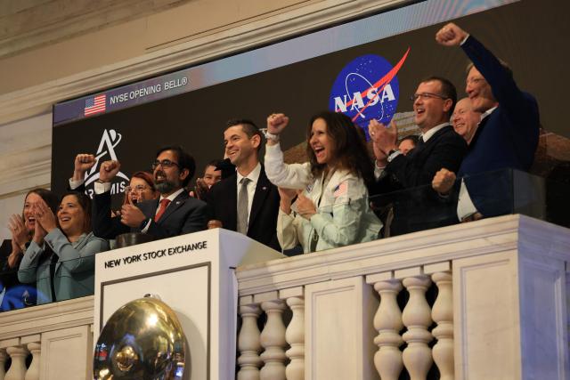 NASA Administrator Jared Isaacman (C), joined by President of NYSE Group Lynn Martin (C-R), along with NASA leadership, gestures as he rings the opening bell of the New York Stock Exchange, on April 30, 2026, in New York, New York. (Photo by TIMOTHY A. CLARY / AFP)