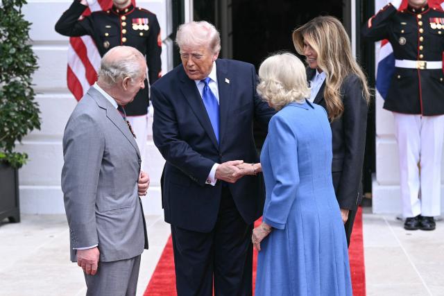 US President Donald Trump and First Lady Melania Trump greet Britain's King Charles III and Queen Camilla during a farewell ceremony on the South Lawn of the White House in Washington, DC, on April 30, 2026. King Charles III and Queen Camilli are wrapping up their visit to the United States and will head to Bermuda next. (Photo by Brendan SMIALOWSKI / AFP)