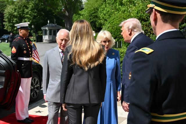 US President Donald Trump and First Lady Melania Trump greet Britain's King Charles III and Queen Camilla during a formal farewell on the South Lawn of the White House in Washington, DC, on April 30, 2026. King Charles III and Queen Camilla are wrapping up their visit to the United States and will head to Bermuda next. (Photo by Mandel NGAN / AFP)