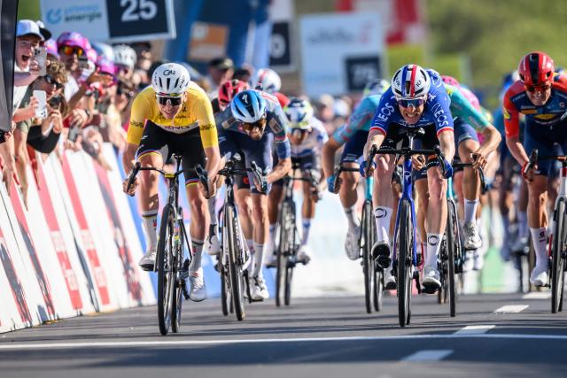UAE Team Emirates-XRG's Slovenian rider Tadej Pogacar (L) sprints to win ahead of INEOS Grenadiers’ French rider Dorion Godon (R) during the second stage of the Tour of Romandie UCI cycling World tour, 173.1 km from Rue to Vucherens, in Vucherens, on April 30, 2026. (Photo by Fabrice COFFRINI / AFP)
