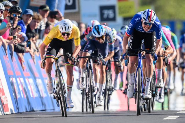 UAE Team Emirates-XRG's Slovenian rider Tadej Pogacar (L) sprints to win ahead of INEOS Grenadiers’ French rider Dorion Godon (R) during the second stage of the Tour of Romandie UCI cycling World tour, 173.1 km from Rue to Vucherens, in Vucherens, on April 30, 2026. (Photo by Fabrice COFFRINI / AFP)