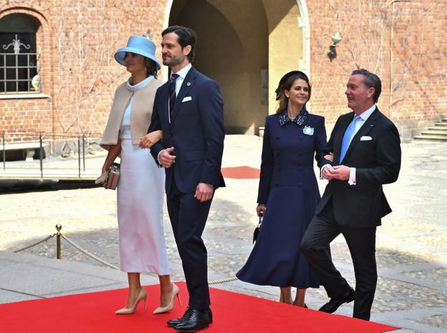 (LtoR) Princess Sofia of Sweden, Prince Carl Philip of Sweden, Princess Madeleine of Sweden and her husband Chris O'Neill arrive to attend a lunch at the City Hall as part of the celebrations of King Carl XVI Gustaf of Sweden's 80th birthday in Stockholm, Sweden, on April 30, 2026. (Photo by Claudio BRESCIANI / TT News Agency / AFP) / Sweden OUT