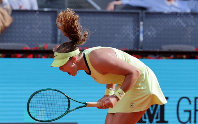 Russia's Mirra Andreeva celebrates winning her 2026 WTA Tour Madrid Open tennis tournament women's semi-final singles match against USA's Hailey Baptiste at the Caja Magica in Madrid, on April 30, 2026. Andreeva won 6-4 7-6. (Photo by Thomas COEX / AFP)