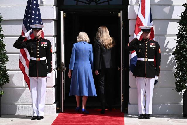 First Lady Melania Trump walks with Britain's Queen Camilla during a farewell ceremony on the South Lawn of the White House in Washington, DC, on April 30, 2026. King Charles III and Queen Camilla are wrapping up their visit to the United States and will head to Bermuda next. (Photo by Brendan SMIALOWSKI / AFP)