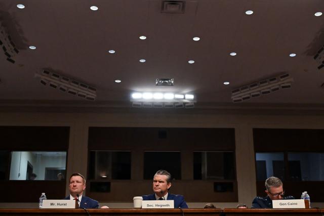 (L/R) Acting Pentagon Comptroller Jules W. Hurst III, US Secretary of Defense Pete Hegseth and US Chairman of the Joint Chiefs of Staff Gen. Dan Caine testify during a Senate Armed Services Committee hearing on the Department of Defense budget request for Fiscal Year 2027 on Capitol Hill in Washington, DC, on April 30, 2026. (Photo by Alex WROBLEWSKI / AFP)
