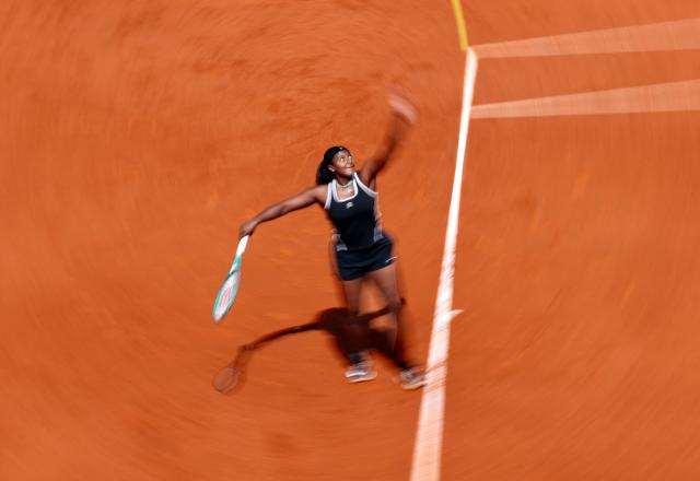USA's Hailey Baptiste serves to Russia's Mirra Andreeva during their 2026 WTA Tour Madrid Open tennis tournament women's semi-final singles match at the Caja Magica in Madrid, on April 30, 2026. (Photo by Thomas COEX / AFP)