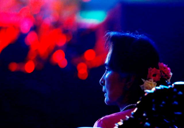 (FILES) Myanmar's State Counsellor Aung San Suu Kyi attends attends the Union of Myanmar Federation of Chambers of Commerce and Industry (UMFCCI) conference in Naypyidaw on November 22, 2019. Myanmar's junta-chief turned president on April 30, 2026 ordered deposed leader Aung San Suu Kyi to be moved to house arrest, five years after sweeping her into detention in a 2021 coup. (Photo by Thet AUNG / AFP)