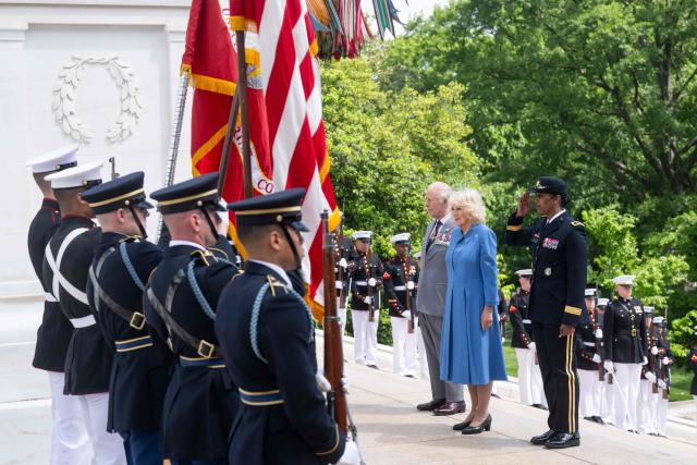 Britain's King Charles III and Queen Camilla lay a wreath at the tomb of the unknown soldier in Arlington National Cemetary in Arlington, Virginia on April 30, 2026. (Photo by SAUL LOEB / POOL / AFP)