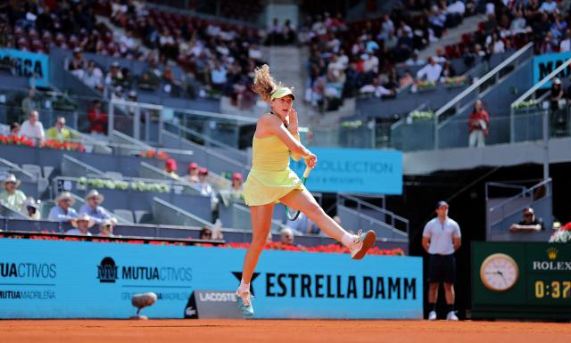 Russia's Mirra Andreeva returns a ball to  USA's Hailey Baptiste  during their 2026 WTA Tour Madrid Open tennis tournament women's semi-final singles match at the Caja Magica in Madrid, on April 30, 2026. (Photo by Thomas COEX / AFP)