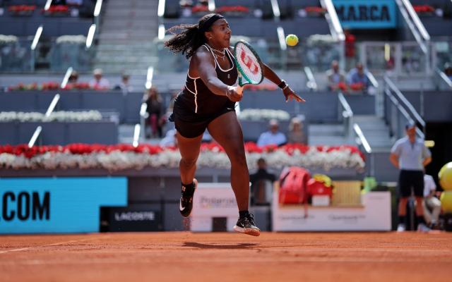 USA's Hailey Baptiste returns a ball to Russia's Mirra Andreeva during their 2026 WTA Tour Madrid Open tennis tournament women's semi-final singles match at the Caja Magica in Madrid, on April 30, 2026. (Photo by Thomas COEX / AFP)