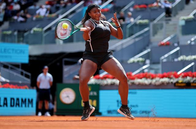 USA's Hailey Baptiste returns a ball to Russia's Mirra Andreeva during their 2026 WTA Tour Madrid Open tennis tournament women's semi-final singles match at the Caja Magica in Madrid, on April 30, 2026. (Photo by Thomas COEX / AFP)
