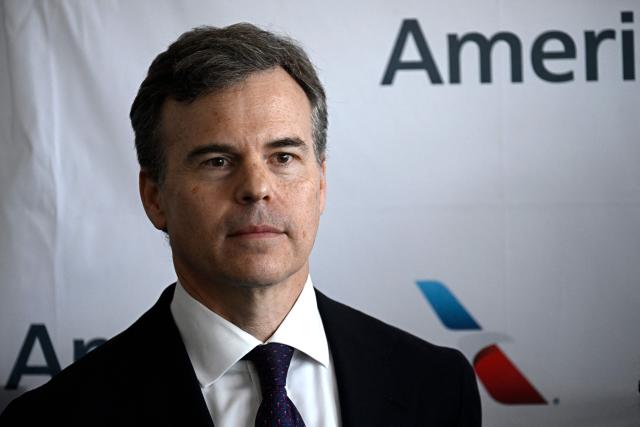Head of the US diplomatic mission in Venezuela John Barrett looks on during a press conference at Simon Bolivar International Airport in La Guaira, La Guaira state, Venezuela, ahead of the arrival of a flight from Miami on April 30, 2026. The first direct flight between the United States and Venezuela in seven years took off on April 30, a new sign of a thaw after Washington deposed leftist leader Nicolas Maduro. (Photo by Federico PARRA / AFP)