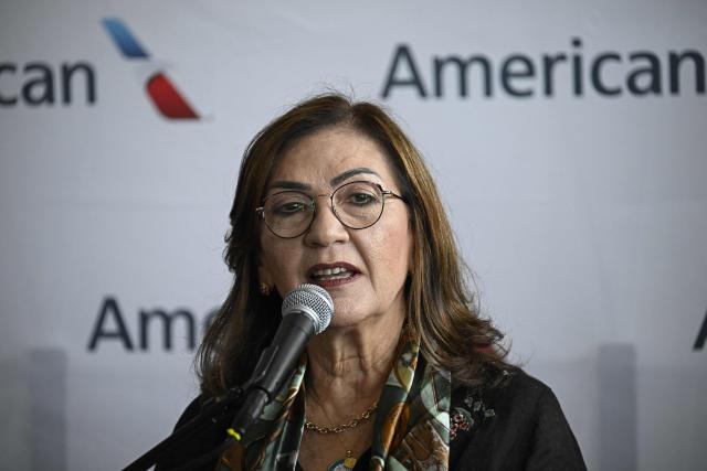 Venezuela’s Transport Minister Jacqueline Faria speaks during a press conference at Simon Bolivar International Airport in La Guaira, La Guaira state, Venezuela, ahead of the arrival of a flight from Miami on April 30, 2026. The first direct flight between the United States and Venezuela in seven years took off on April 30, a new sign of a thaw after Washington deposed leftist leader Nicolas Maduro. (Photo by Federico PARRA / AFP)
