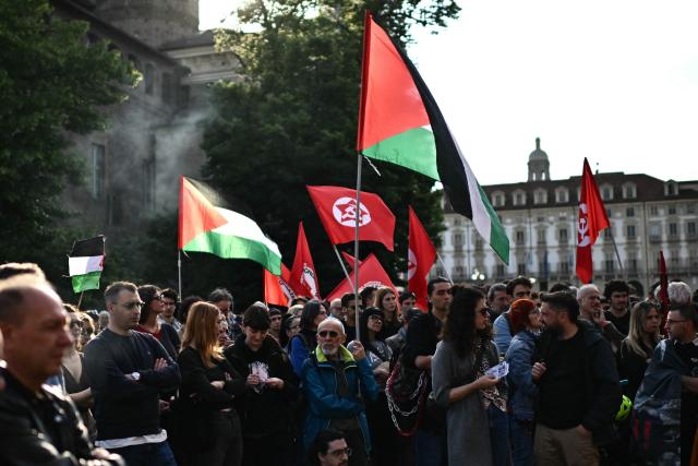 Protestors hold Palestinian flags during a demonstration to condemn the interception of the Global Sumud Flotilla by the Israeli army, in Turin on April 30, 2026. The Israeli navy intercepted and halted part of the Global Sumud Flotilla, a convoy of vessels bound for Gaza as it sailed in international waters west of the island of Crete. According to Israeli sources and flotilla organizers, at least twenty boats were boarded and around 175 activists were detained and transferred to Israel. (Photo by MARCO BERTORELLO / AFP)