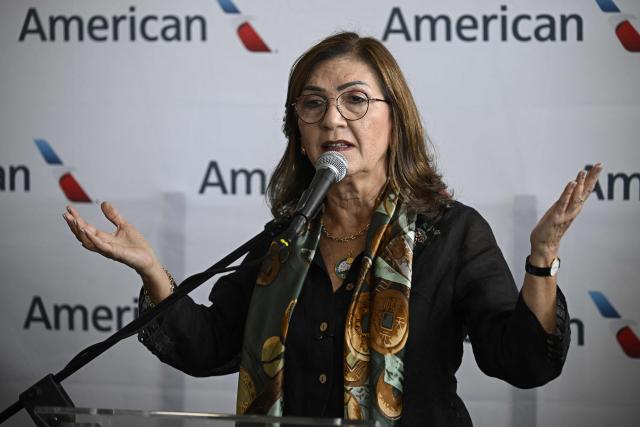 Venezuela’s Transport Minister Jacqueline Faria speaks during a press conference at Simon Bolivar International Airport in La Guaira, La Guaira state, Venezuela, ahead of the arrival of a flight from Miami on April 30, 2026. The first direct flight between the United States and Venezuela in seven years took off on April 30, a new sign of a thaw after Washington deposed leftist leader Nicolas Maduro. (Photo by Federico PARRA / AFP)