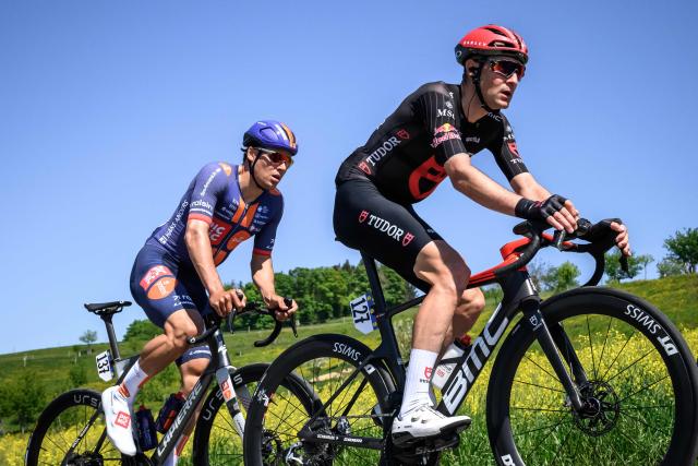 Team Picnic PostNL’s French rider Henri-Francois Renard-Haquin (L) and Tudor Pro Cycling Team’s Swiss rider Roland Thalmann rides during the second stage of the Tour of Romandie UCI cycling World tour, 173.1 km from Rue to Vucherens, near Vulliens, on April 30, 2026. (Photo by Fabrice COFFRINI / AFP)
