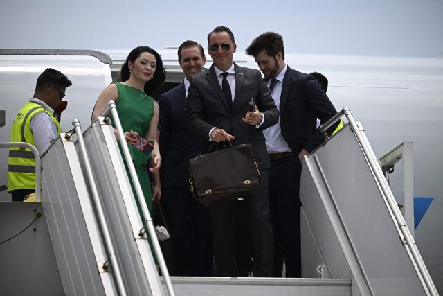 Jarrod Agen, executive director of the US National Energy Dominance Council, disembarks an American Eagle aircraft, operating a regional flight for American Airlines, after landing at Simon Bolivar International Airport in La Guaira, La Guaira state, Venezuela on April 30, 2026. The first direct commercial flight between the United States and Venezuela in seven years arrived in Caracas on April 30, marking a new sign of a thaw after Washington deposed leftist leader Nicolas Maduro and resumed diplomatic relations following years of tension. (Photo by Federico PARRA / AFP)