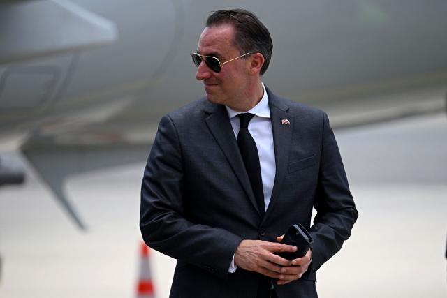 Jarrod Agen, executive director of the US National Energy Dominance Council, disembarks an American Eagle aircraft, operating a regional flight for American Airlines, after landing at Simon Bolivar International Airport in La Guaira, La Guaira state, Venezuela on April 30, 2026. The first direct commercial flight between the United States and Venezuela in seven years arrived in Caracas on April 30, marking a new sign of a thaw after Washington deposed leftist leader Nicolas Maduro and resumed diplomatic relations following years of tension. (Photo by Federico PARRA / AFP)