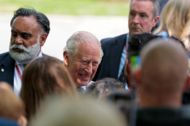 Britain's King Charles talks with community members during block party on April 30, 2026 in Front Royal, Virginia. (Photo by Kylie Cooper / POOL / AFP)