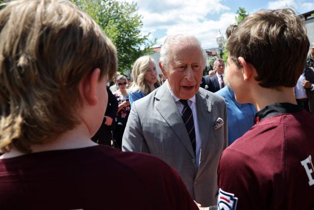 Britain's King Charles III greets the Virginia state champions Front Royal Little League baseball team during a parade and block party event on the final day of the state visit of King Charles III and Queen Camilla on April 30, 2026 in Front Royal, Virginia. (Photo by Win McNamee / POOL / AFP)