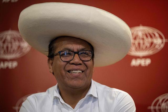 Peru's presidential candidate Roberto Sanchez, for the Juntos por el Peru party, gestures during a press conference to the Peruvian Association of Foreign Press in Lima on April 30, 2026. (Photo by Ernesto BENAVIDES / AFP)