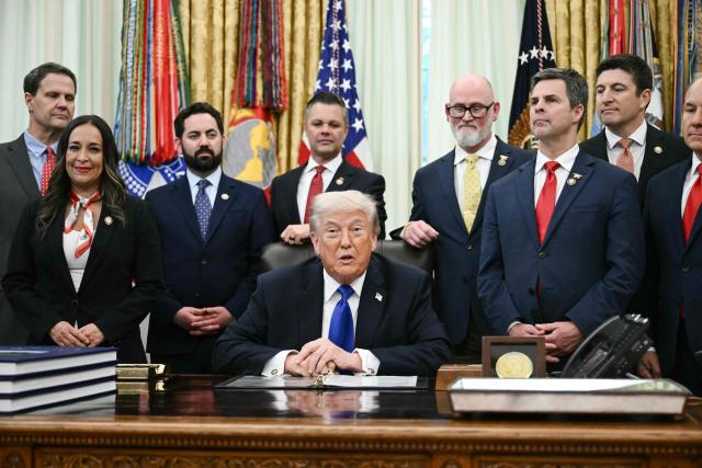 US President Donald Trump speaks as he holds an event to sign an executive order in the Oval Office at the White House in Washington, DC on April 30, 2026. (Photo by Brendan SMIALOWSKI / AFP)
