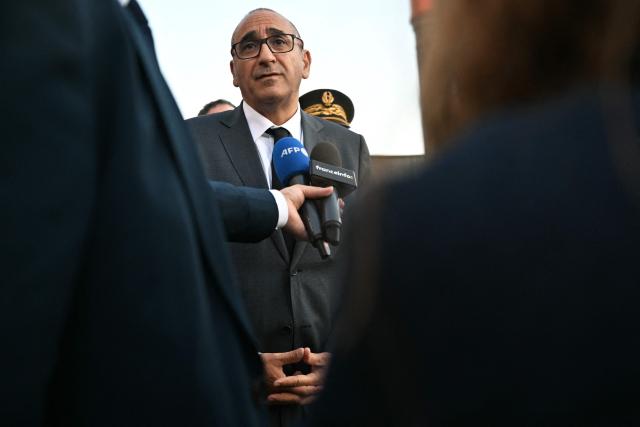 France's Interior Minister Laurent Nunez speaks to press during a visit in Les Mureaux, on the outskirts of Paris, on April 30, 2026, for a visit which is focused on the urban violences that have affected the Yvelines French Department. (Photo by Martin LELIEVRE / AFP)