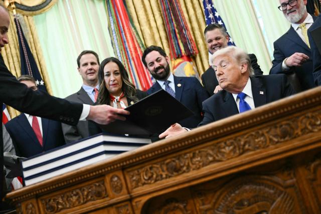 US President Donald Trump speaks before signing executive orders in the Oval Office at the White House in Washington, DC on April 30, 2026. (Photo by Brendan SMIALOWSKI / AFP)