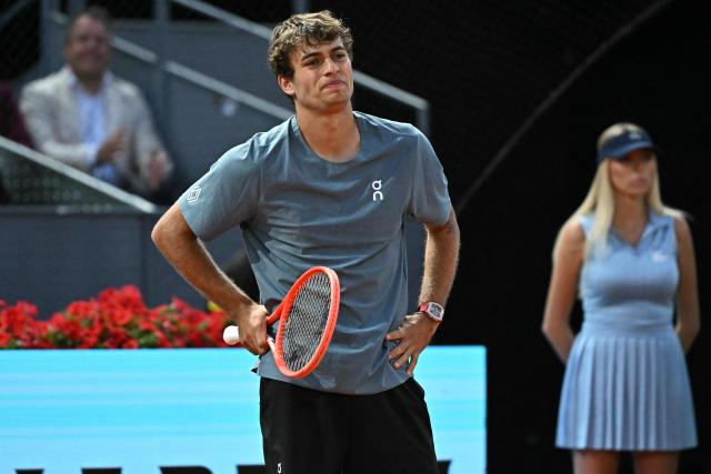 Italy's Flavio Cobolli reacts during his 2026 ATP Tour Madrid Open tennis tournament quarter-final singles match against Germany's Alexander Zverev  at the Caja Magica in Madrid, on April 30, 2026. (Photo by Javier SORIANO / AFP)