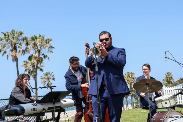 A Jazz quartet, formed by members of the American Federation of Musicians Local 47, performs during the Los Angeles Jazz Festival Ticket On-Sale & Headline Artist announcement at The Inkwell in Santa Monica, California on April 30, 2026. (Photo by VALERIE MACON / AFP)