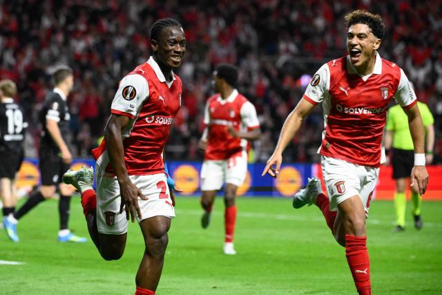 Sporting Braga's Ivorian midfielder #20 Mario Dorgeles (L) celebrates scoring his team's second goal during the UEFA Europa League semi final first leg football match between SC Braga and SC Freiburg at Municipal stadium of Braga on April 30, 2026. (Photo by Miguel RIOPA / AFP)