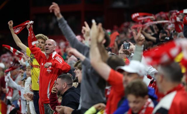 Forest fans celebrates after the UEFA Europa League semi-final first-leg football match between Nottingham Forest and Aston Villa at The City Ground in Nottingham, central England, on April 30, 2026. (Photo by Darren Staples / AFP)