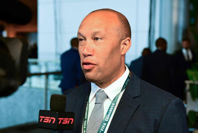 French football legend Mikael Silvestre speaks with a reporter during the 76th FIFA Congress at the Vancouver Convention Centre on April 30, 2026 in Vancouver, Canada. (Photo by Don MacKinnon / AFP)
