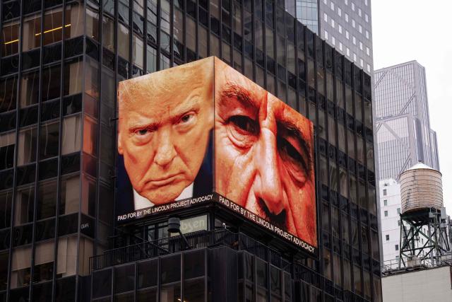 A digital billboard, paid for by The Lincoln Project Advocacy, shows images of US President Donald Trump (L) and late convicted sex offender Jeffrey Epstein in Times Square in New York City on April 30, 2026. The US Justice Department's internal watchdog said Thursday it will investigate its compliance with a law mandating the release of millions of pages of documents in the case of sex offender Jeffrey Epstein. (Photo by Adam GRAY / AFP)
