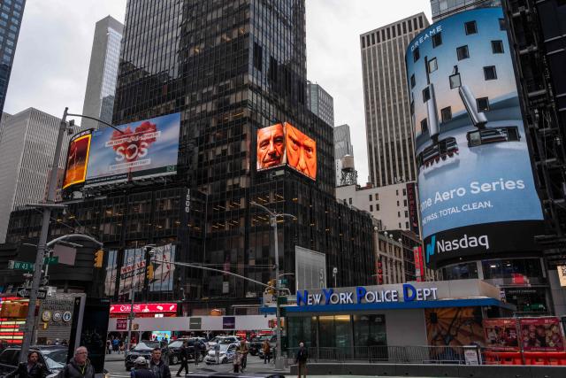 A digital billboard, paid for by The Lincoln Project Advocacy, shows images of US President Donald Trump (R) and late convicted sex offender Jeffrey Epstein in Times Square in New York City on April 30, 2026. The US Justice Department's internal watchdog said Thursday it will investigate its compliance with a law mandating the release of millions of pages of documents in the case of sex offender Jeffrey Epstein. (Photo by Adam GRAY / AFP)