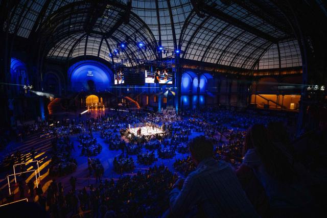 This photograph shows a general view of the Grand Palais during an ISKA World Kickboxing Championship event in Paris on April 30, 2026. (Photo by Dimitar DILKOFF / AFP)